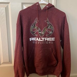 I’m selling this burgundy Realtree Outfitters Hoodie.